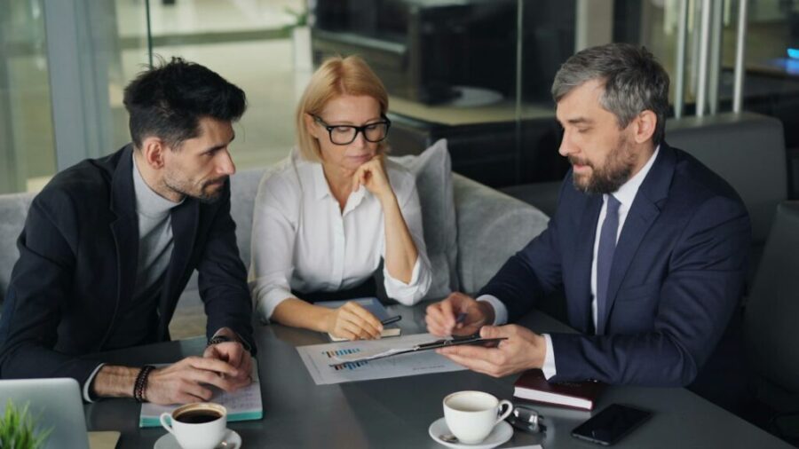 Professionals meeting around a table
